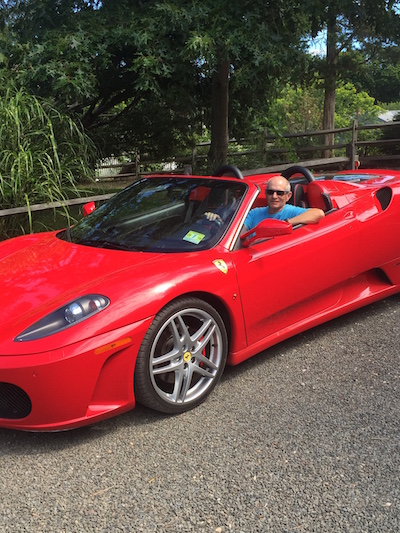 Your editor going for  a ride in a Ferrari